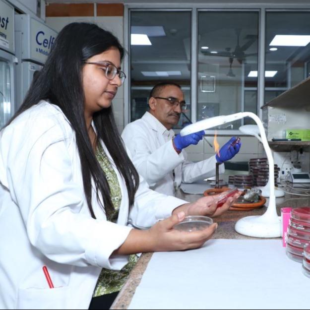 M.D. (Microbiology)